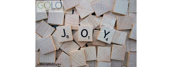 Joy spelled out in scrabble pieces