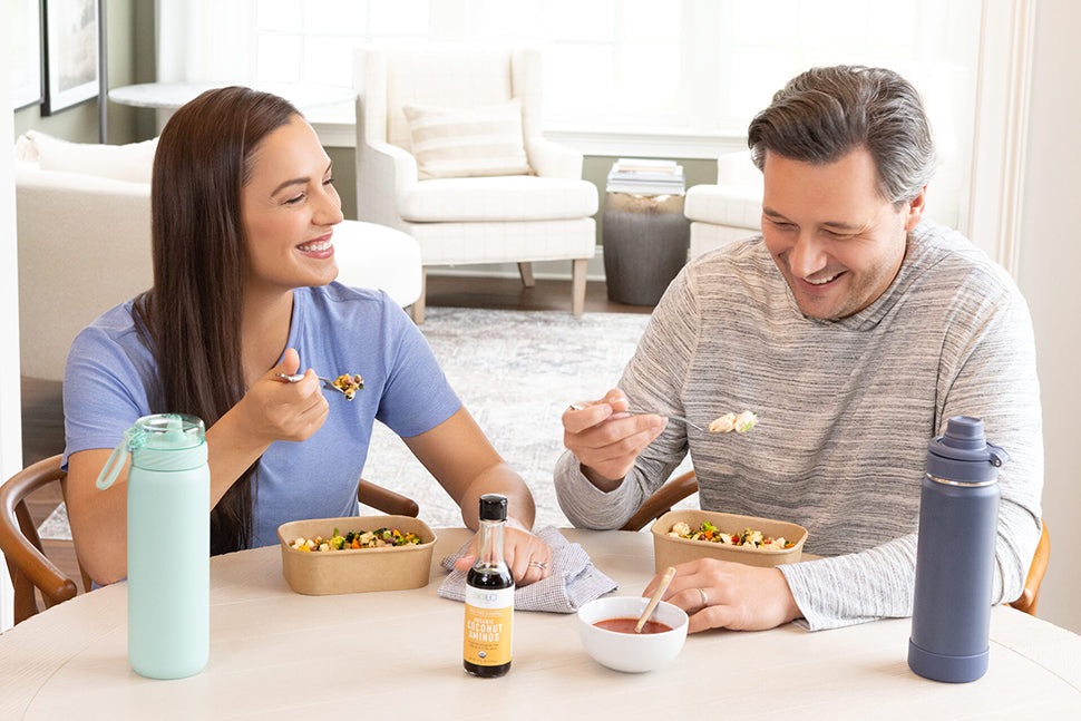 A couple eating at a table