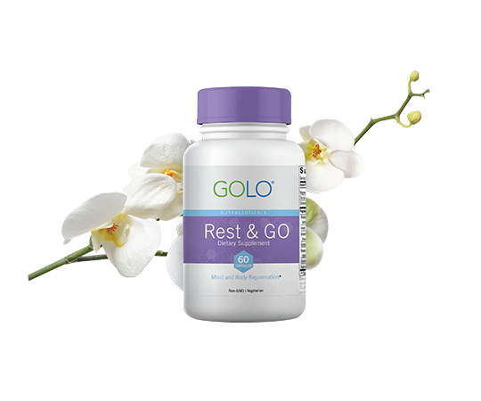 Rest and Go bottle with flowers behind the bottle