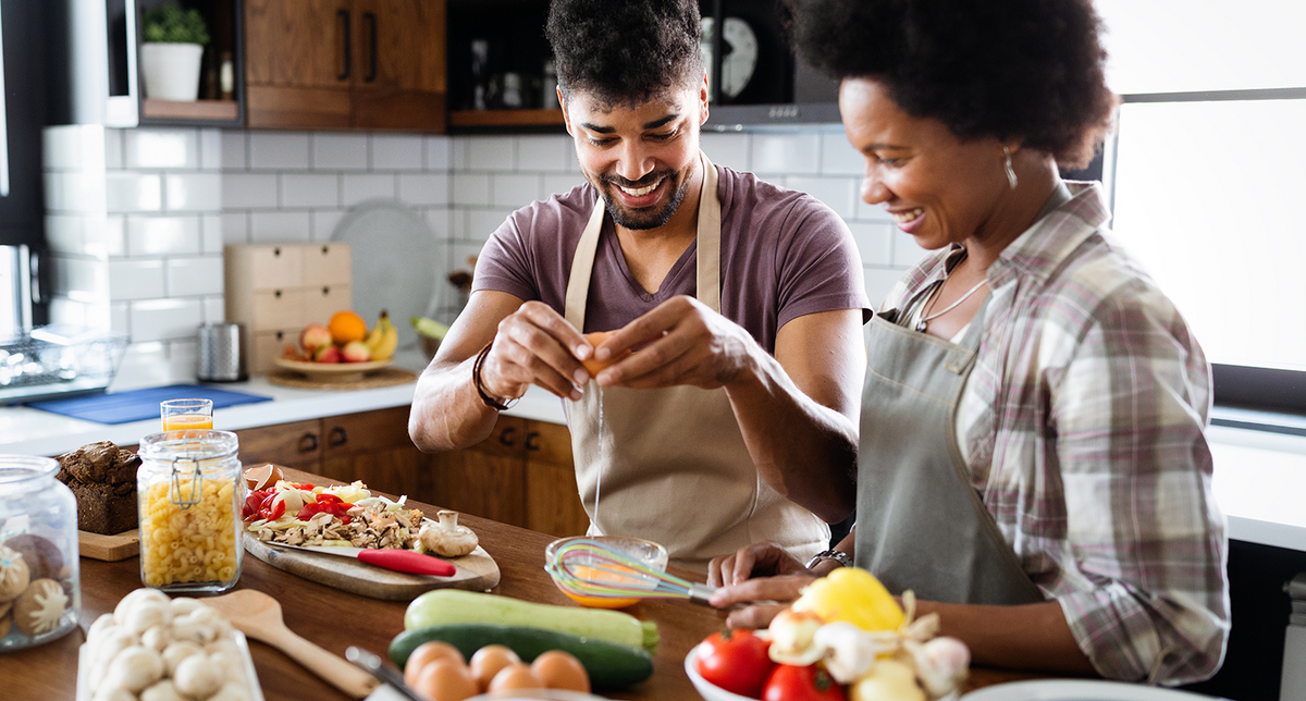 Couple making a meal together